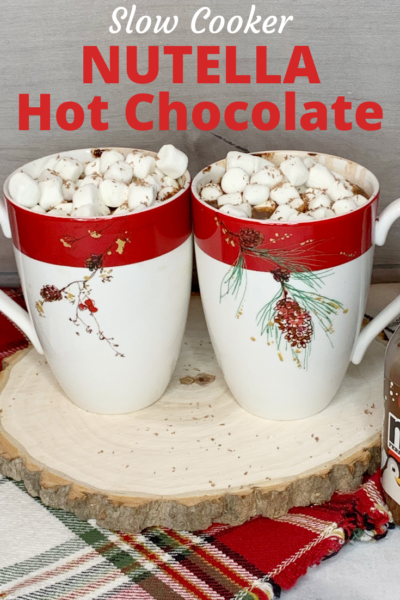 This slow cooker Nutella Hot Chocolate recipe is perfect for holiday parties, Christmas morning or all winter long! #HotChocolate #Nutella #SlowCooker #SlowCookerHotChocolate This slow cooker Nutella Hot Chocolate recipe is perfect for holiday parties, Christmas morning or all winter long! #HotChocolate #Nutella #SlowCooker #SlowCookerHotChocolate