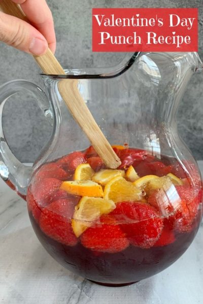 Need easy Valentines cocktails? This Sparkling Red Punch is the perfect drink recipe for your romantic Valentines Day or Galentines Day celebration. It's sweet, red and delicious! #ValentinesCocktailRecipes #EasyValentinesCocktails #ValentinesDrinkRecipes #ChampagneCocktail #RedCocktails #RedCocktailRecipe #RedPunchRecipe
