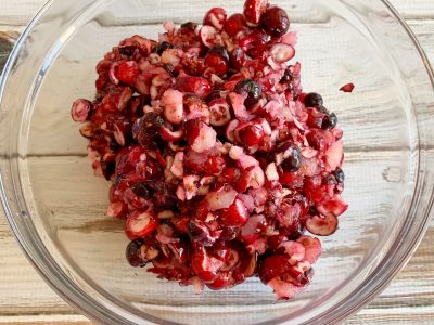 Cranberries marinating with pineapple juice and sugar Cranberries marinating with pineapple juice and sugar