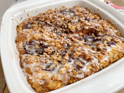 Adding glaze on top of Cranberry Coffee Cake Adding glaze on top of Cranberry Coffee Cake