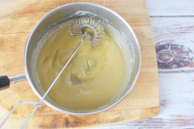 Flour and butter mixture over stovetop Flour and butter mixture over stovetop
